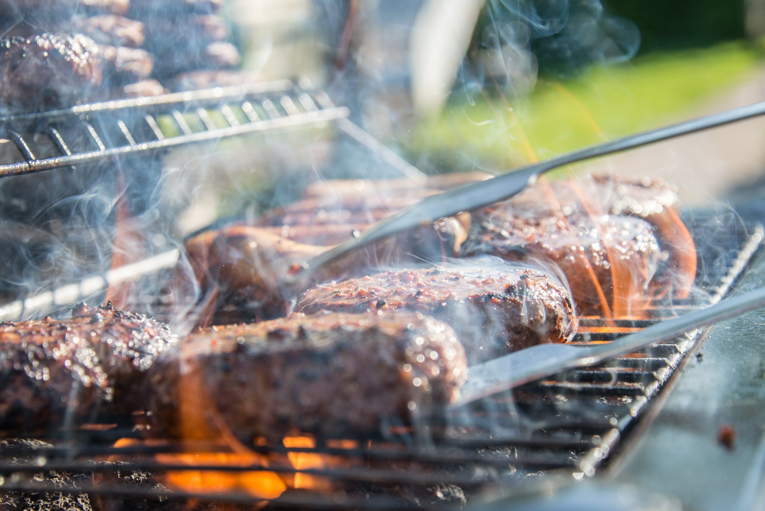 Which is better to use charcoal, wood, or propane when grilling?